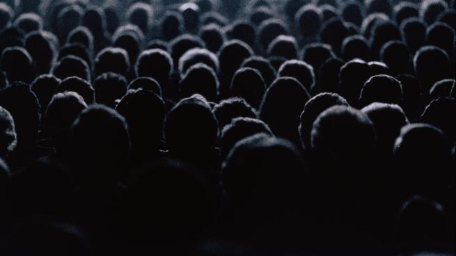 An audience listening to a talk