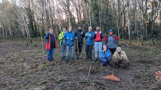 This is a group picture of the practical team volunteers what had completed the work at a project for The Friends of Heath Nursery Woods. 
