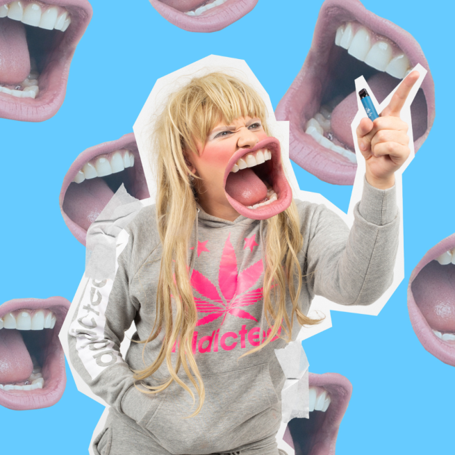 Bailey J Mills in a grey hoody pointing with her mouth photoshopped much bigger. Behind her is a blue background with repeated open mouths.