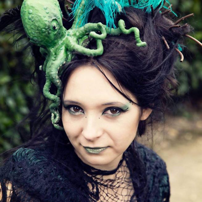 a woman in an octopus headpiece