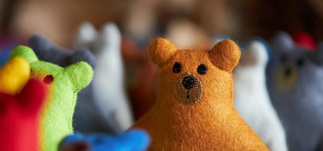 Photograph of some colourful woollen bears
