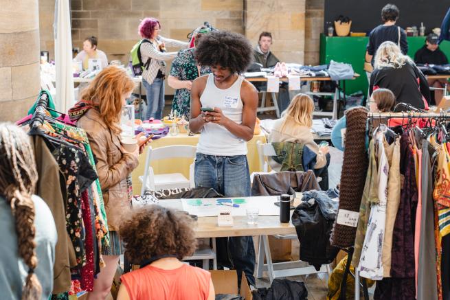 STALLS AND CUSTOMERS AT LS6 JUNK YARD SALE
