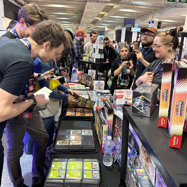people looking at a stall