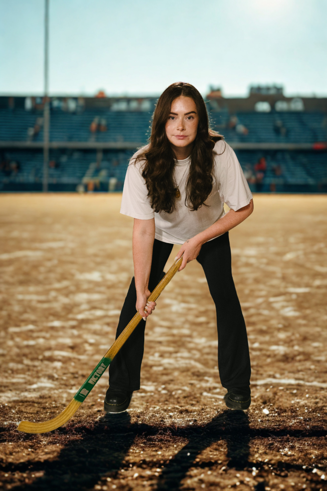 Daisy Meredith playing Hockey