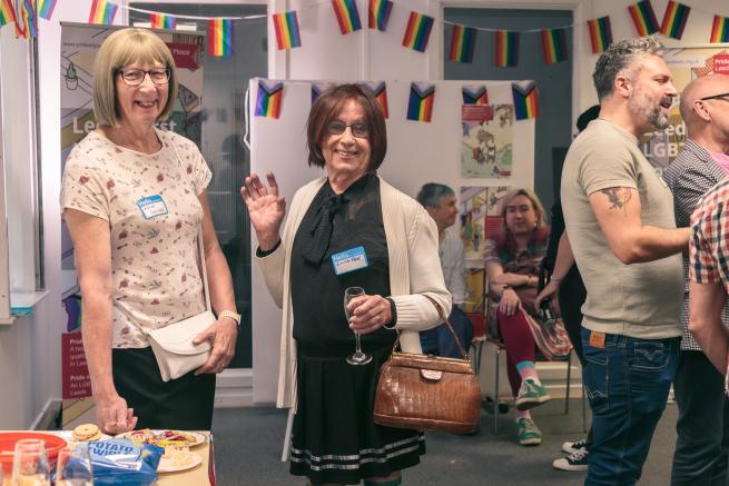 Photo of people socialising at Pride Place