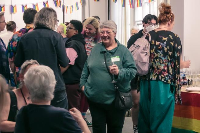 Photo of people socialising at Pride Place