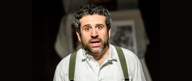 Solomon looking down the cambra in a shocked way
