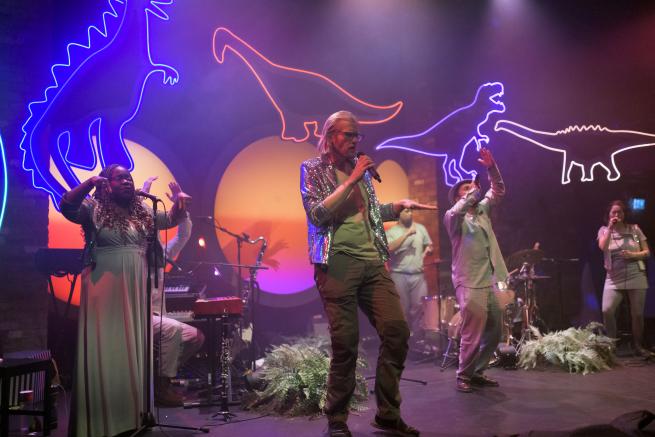 People singing on stage