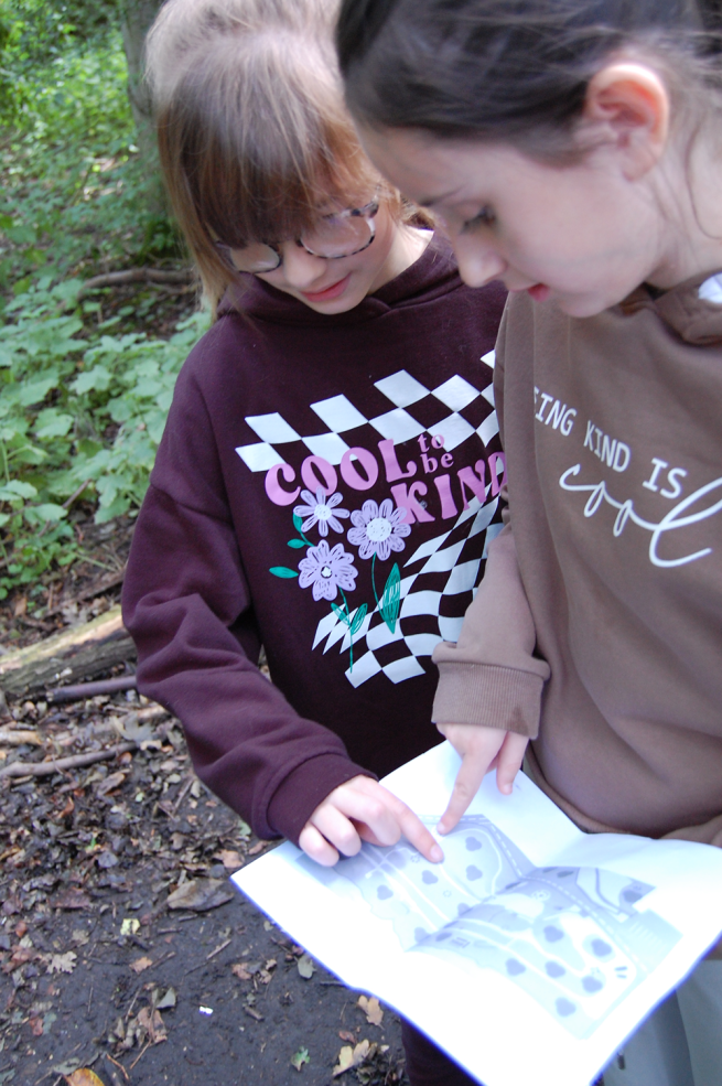 children looking at a map