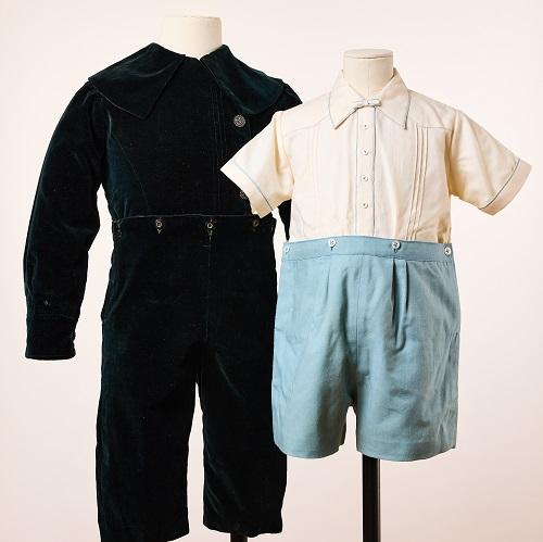 photograph of mannequins with historic children's clothes