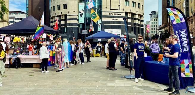 Colourful photo of stalls from 2024