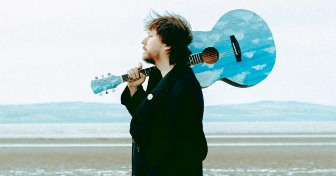 the artist with blue guitar