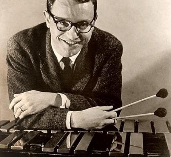 Cal Tjader playing a vibraphone 