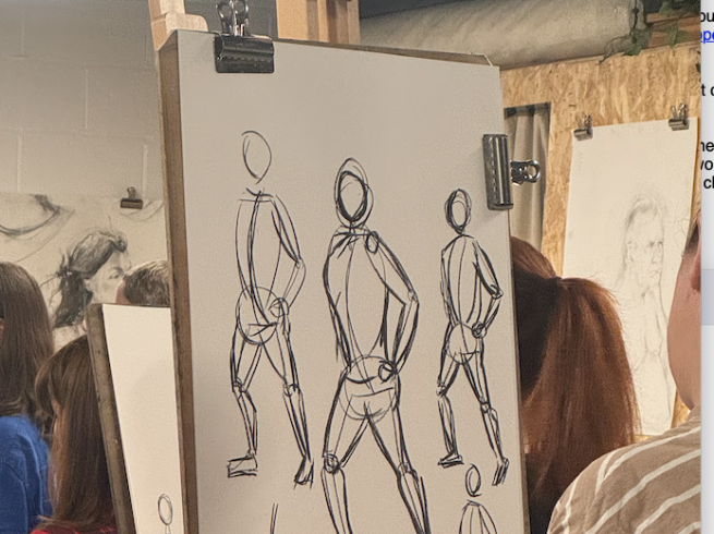 Gesture drawings on an easel 