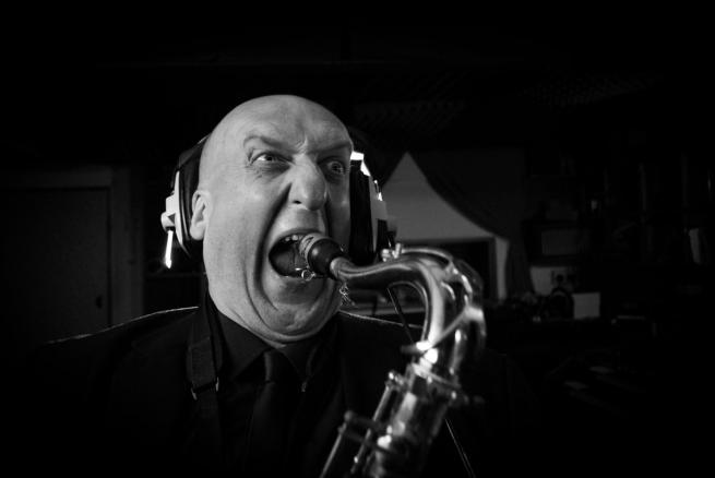 Tony Burkill playing saxophone