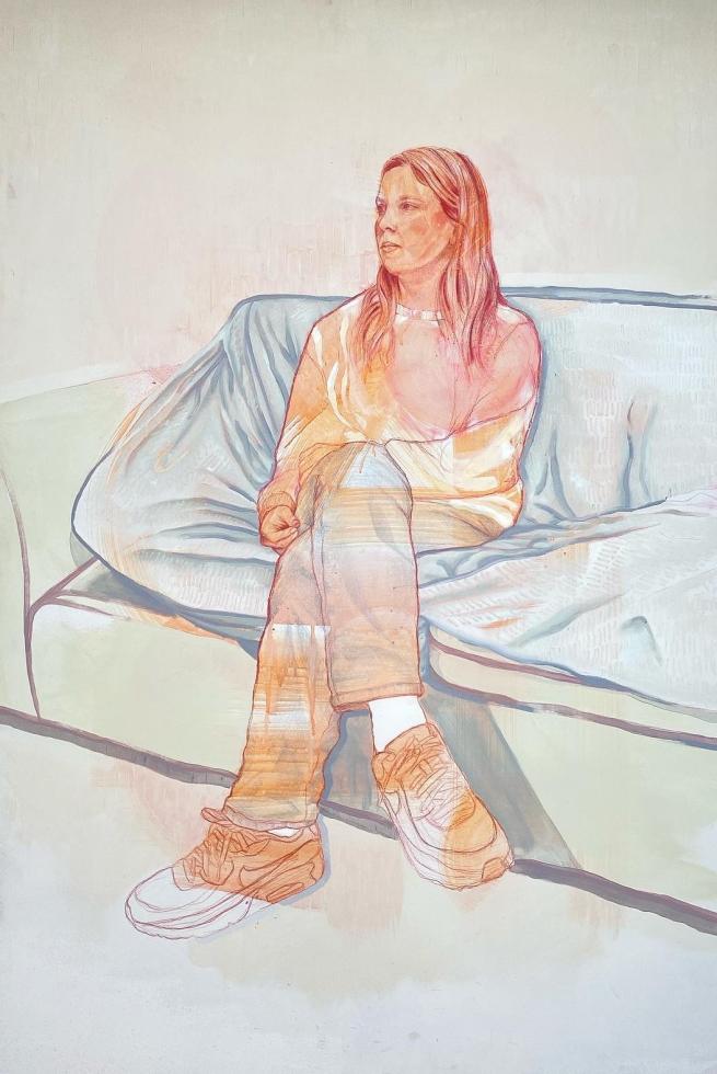 Painting of a woman sitting cross legged