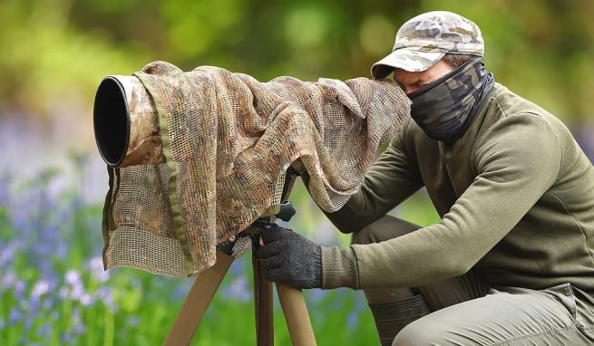 Photo of photograhpher at work in field