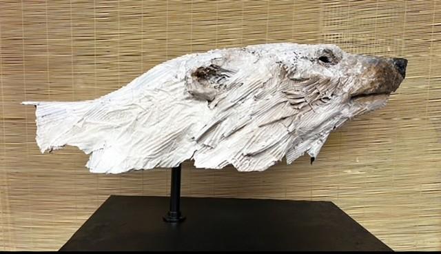 Head of bear made from recycled packaging paper