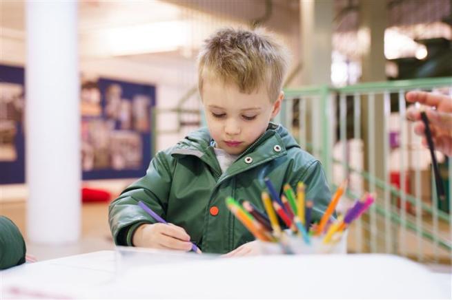 Child drawing in the Leeds Artspace