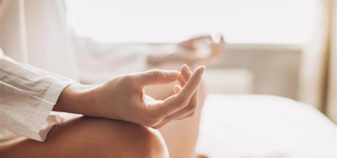 An image of somebody meditating