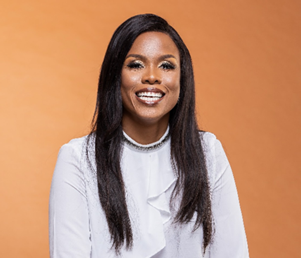 Brown skinned with long black hair, white shirt 