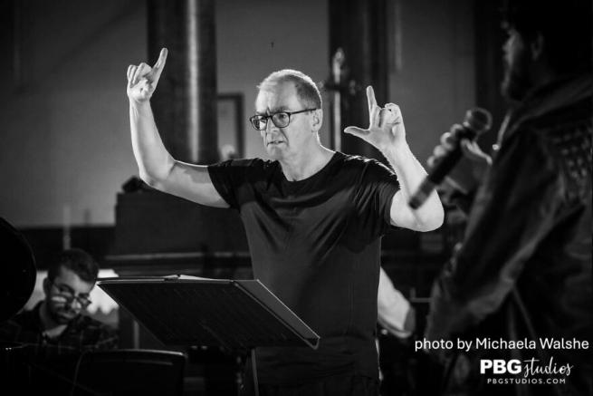Photo Paul Whittaker conducting