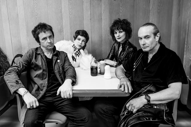 Black and white portrait of the band