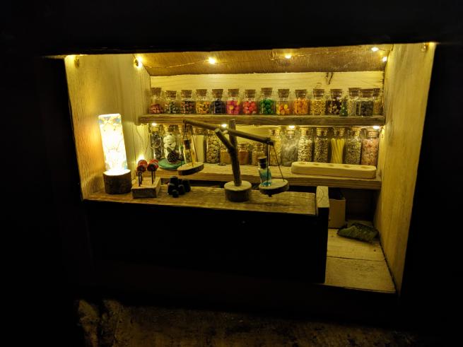 A miniature shop with atmospheric lighting