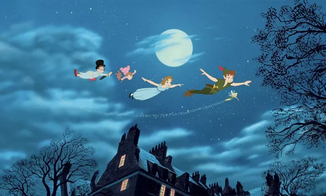 Peter Pan and his human acolytes fly through the night sky.