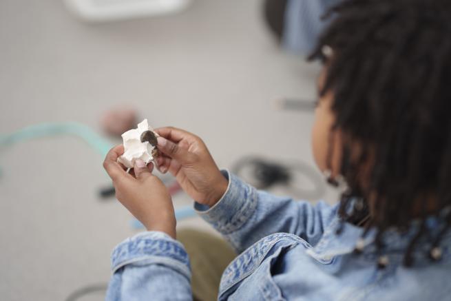 Arts participation activity at a arts gallery with child participation.