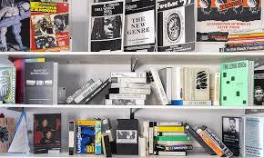 Books on a book shelf one that says black film British cinema 
