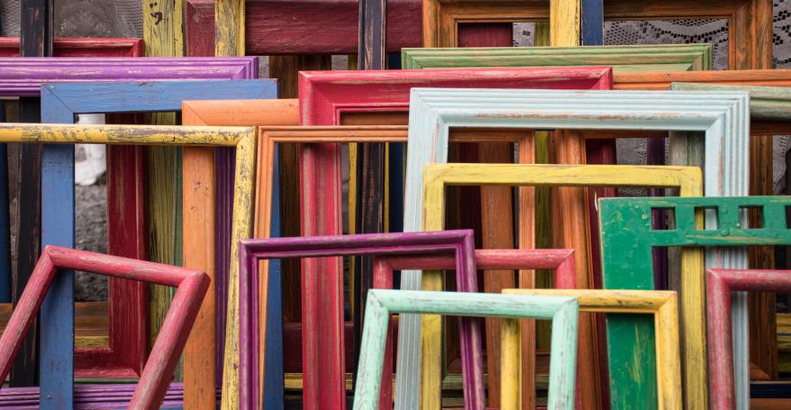 Lots of colourful picture frames 