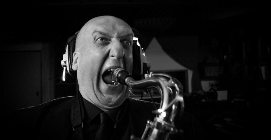 Tony Burkill plays saxophone 