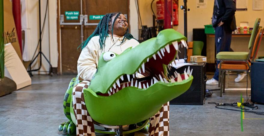 Elliotte Williams-N'Dure (The Enormous Crocodile) in rehearsals. Photography by Manuel Harlan