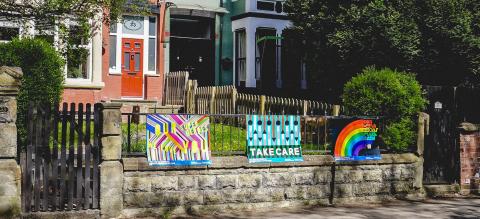 posters in front of a house