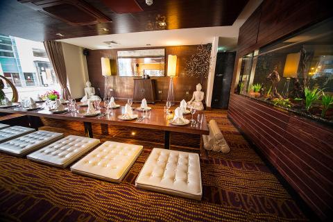 Wide shot of private dining room with sunken seating.