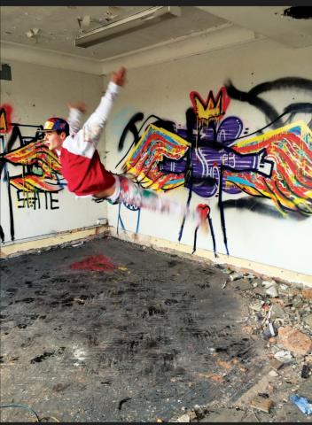 an artist flying through the air
