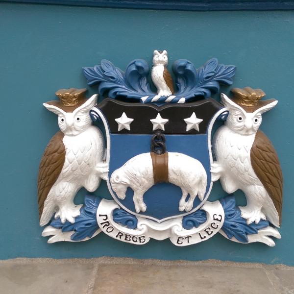 Leeds crest from Leeds Bridge - the owls and sheep