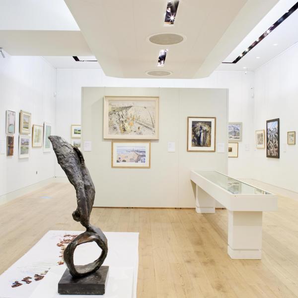 The exhibition space in The Stanley & Audrey Burton Gallery, with a bronze sculpture and paintings
