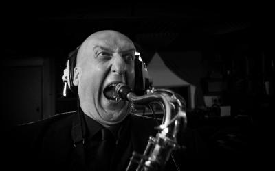 Tony Burkill plays saxophone 