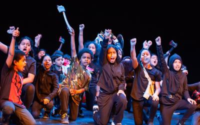 Young people in a group on stage