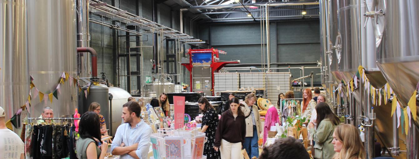 Mindful Market in full swing with shoppers browsing each stall holder.